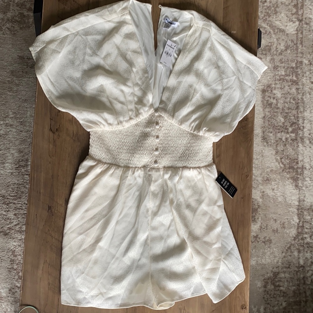 Brand new express romper size small